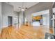 Open-concept living area showcasing gleaming hardwood floors and seamless transition to the kitchen at 2288 S Paraham Rd, York, SC 29745