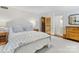 Neutral toned bedroom showcasing a comfortable bed, wood floors, and neutral decor at 2315 Red Fox Trl, Charlotte, NC 28211