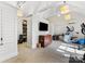 Bright exercise room with vaulted ceilings, wall-mounted TV, and closet shelving at 2315 Red Fox Trl, Charlotte, NC 28211