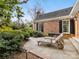 Cozy patio area with chaise lounges, perfect for enjoying the outdoors in a tranquil setting at 2315 Red Fox Trl, Charlotte, NC 28211