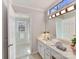 Clean bathroom with updated vanity and a shower/tub combo at 2410 Hopecrest Dr, Charlotte, NC 28210