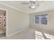 Well-lit bedroom with two windows and an attached bathroom at 2410 Hopecrest Dr, Charlotte, NC 28210