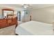 Basement bedroom with wooden dresser and window at 2410 Hopecrest Dr, Charlotte, NC 28210