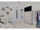 Neutral-toned bedroom featuring a large dresser with storage and a closet, offering ample space at 2943 Village Center Dr, Dallas, NC 28034