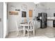 Bright dining area with a table set for four and modern decor at 2943 Village Center Dr, Dallas, NC 28034