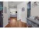 Inviting hallway with hardwood floors that lead to a spacious living area at 2943 Village Center Dr, Dallas, NC 28034