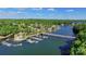 Scenic aerial view of a bridge and boat docks surrounded by lakefront homes and lush greenery at 296 Windemere Isle Rd, Statesville, NC 28677