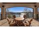 Beautiful balcony featuring a lake view and a wooden table with seating for four at 296 Windemere Isle Rd, Statesville, NC 28677