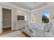 Bedroom with natural light, neutral tones, and an ensuite bathroom at 296 Windemere Isle Rd, Statesville, NC 28677