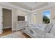 Cozy bedroom featuring a trey ceiling and a TV atop a white dresser at 296 Windemere Isle Rd, Statesville, NC 28677