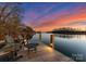 Dock with outdoor seating at sunset at 296 Windemere Isle Rd, Statesville, NC 28677