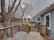 View of the backyard from the deck with various trees and a partial view of the house at 3138 Morson St, Charlotte, NC 28208