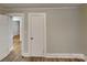 Bright bedroom featuring neutral paint and access to another room at 3138 Morson St, Charlotte, NC 28208