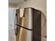 Stainless steel refrigerator in kitchen with access to another room at 3138 Morson St, Charlotte, NC 28208