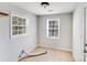 Well-lit room with tile flooring and two windows, offering great natural light at 3138 Morson St, Charlotte, NC 28208