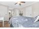 Bedroom features hardwood floors, natural light, and neutral paint at 3300 Chancellor Ln, Monroe, NC 28110