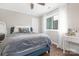 Bedroom features hardwood floors, ceiling fan, and natural light at 3300 Chancellor Ln, Monroe, NC 28110