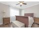 Bedroom featuring wood floors, wooden bed frame, and plenty of natural light at 3300 Chancellor Ln, Monroe, NC 28110