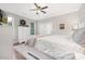 Bright bedroom featuring soft carpet, white furniture, and natural light at 3300 Chancellor Ln, Monroe, NC 28110