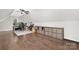 Bonus room featuring hardwood floors, sloped ceilings, and bright light at 3300 Chancellor Ln, Monroe, NC 28110