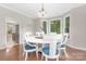 Dining room with wood floors, chandelier and large windows at 3300 Chancellor Ln, Monroe, NC 28110