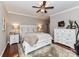 Comfortable main bedroom featuring a decorative rug, dresser, and neutral color palette at 3300 Chancellor Ln, Monroe, NC 28110