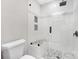 Modern shower with white subway tiles, gray accent tiles, and a built-in bench and shelves at 3300 Chancellor Ln, Monroe, NC 28110