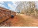 Brick home with backyard, shed, and mature trees at 3301 10Th Ne Ave, Conover, NC 28613