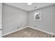 Simple bedroom with hardwood floors and neutral walls at 3301 10Th Ne Ave, Conover, NC 28613