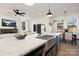 Spacious kitchen with stainless steel sink and modern finishes, connected to an open living space at 3308 Polk And White Rd, Charlotte, NC 28269