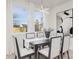 Bright dining room with modern chandelier, ample natural light, and neutral color palette at 3312 Polk And White Rd, Charlotte, NC 28269