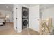 Conveniently located laundry space with a stacked washer and dryer on the second floor at 3312 Polk And White Rd, Charlotte, NC 28269