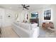 Inviting living room featuring a fireplace with electric insert, white walls, and abundant natural light at 3312 Polk And White Rd, Charlotte, NC 28269