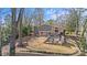 Aerial of outdoor living space, featuring a home with a patio, and an expansive green space at 3723 Annlin Ave, Charlotte, NC 28209