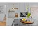 Close-up of a kitchen featuring a dark countertop, custom cabinetry, and stylish decor for a sophisticated culinary space at 3723 Annlin Ave, Charlotte, NC 28209