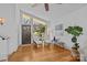 Bright living room with hardwood floors, comfortable seating, and a large window at 3723 Annlin Ave, Charlotte, NC 28209