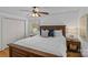 Inviting bedroom with a ceiling fan, two side tables, and a well-lit window at 3723 Annlin Ave, Charlotte, NC 28209