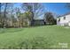 Spacious backyard with a shed and lush lawn at 3920 Admiral Ave, Charlotte, NC 28205