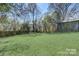 Spacious backyard with shed and trees at 3920 Admiral Ave, Charlotte, NC 28205