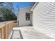 Deck with wood railings next to house at 3920 Admiral Ave, Charlotte, NC 28205