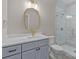 Modern bathroom featuring a vanity with gold hardware and a glass-enclosed walk-in shower at 3945 Ostler Ct, Lancaster, SC 29720