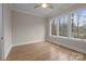 Bedroom with hardwood floors and three large windows at 3945 Ostler Ct, Lancaster, SC 29720