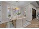 Bright dining room with three windows and an access door to back deck at 3945 Ostler Ct, Lancaster, SC 29720