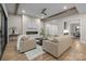 Cozy living room with exposed beams, fireplace, and seamless flow to dining area at 3945 Ostler Ct, Lancaster, SC 29720