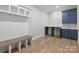 Mud room with blue cabinets, desk and bench with storage at 3945 Ostler Ct, Lancaster, SC 29720