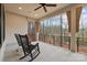 Cozy front porch with rocking chairs, offering a peaceful spot to enjoy the outdoors at 3945 Ostler Ct, Lancaster, SC 29720