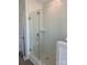 Glass enclosed walk in shower with tiled walls at 4122 Eastover Glen Rd # 0316, Charlotte, NC 28269