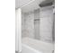 Elegant bathroom with marble tile and a modern shower at 423 W Bell St, Statesville, NC 28677