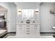 Elegant bathroom with double vanity and modern fixtures at 423 W Bell St, Statesville, NC 28677