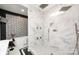 Elegant bathroom with marble shower,freestanding tub, and modern fixtures at 423 W Bell St, Statesville, NC 28677